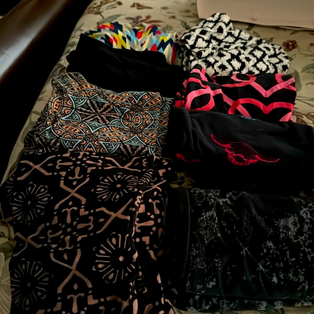 Lularoe soft OS leggings. 8 Multi prints, excellent condition.  $7 each